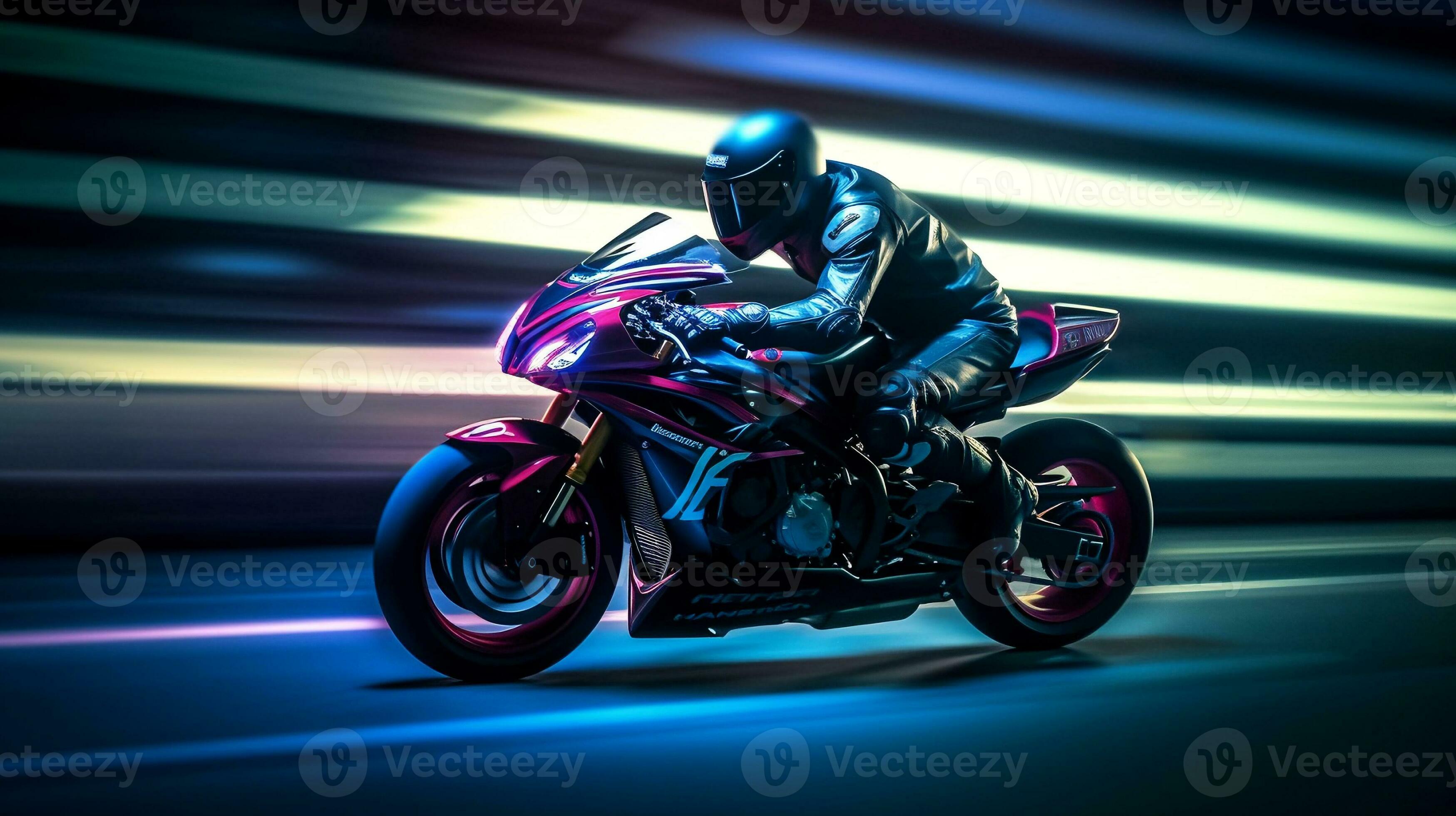Motorcycle racer at high speed on a modern asphalt racetrack